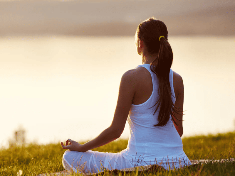 Rashmi conducting Yogalates training session guiding students in yoga and Pilates workout